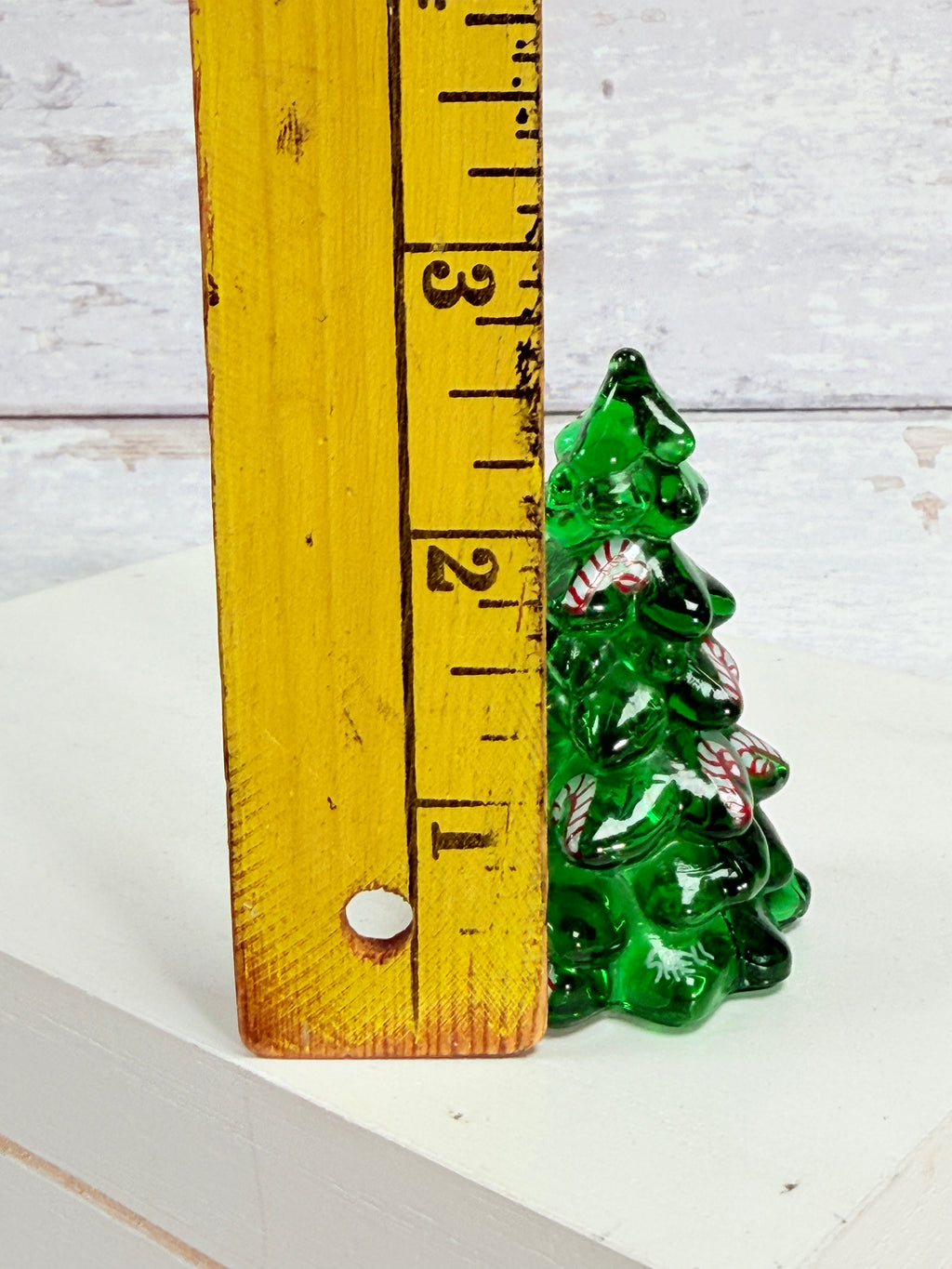 Green glass Christmas tree figurine with candy cane details, hand-painted
