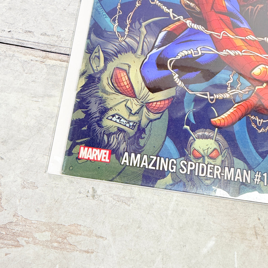 Amazing Spider-Man #13 (2019), Ryan Ottley regular cover with Stan Lee memorial trade dress: lower-left front detail of the actual pre-owned copy.