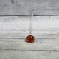 Rose-amber controlled-bubble glass bud vase with long clear neck, front view