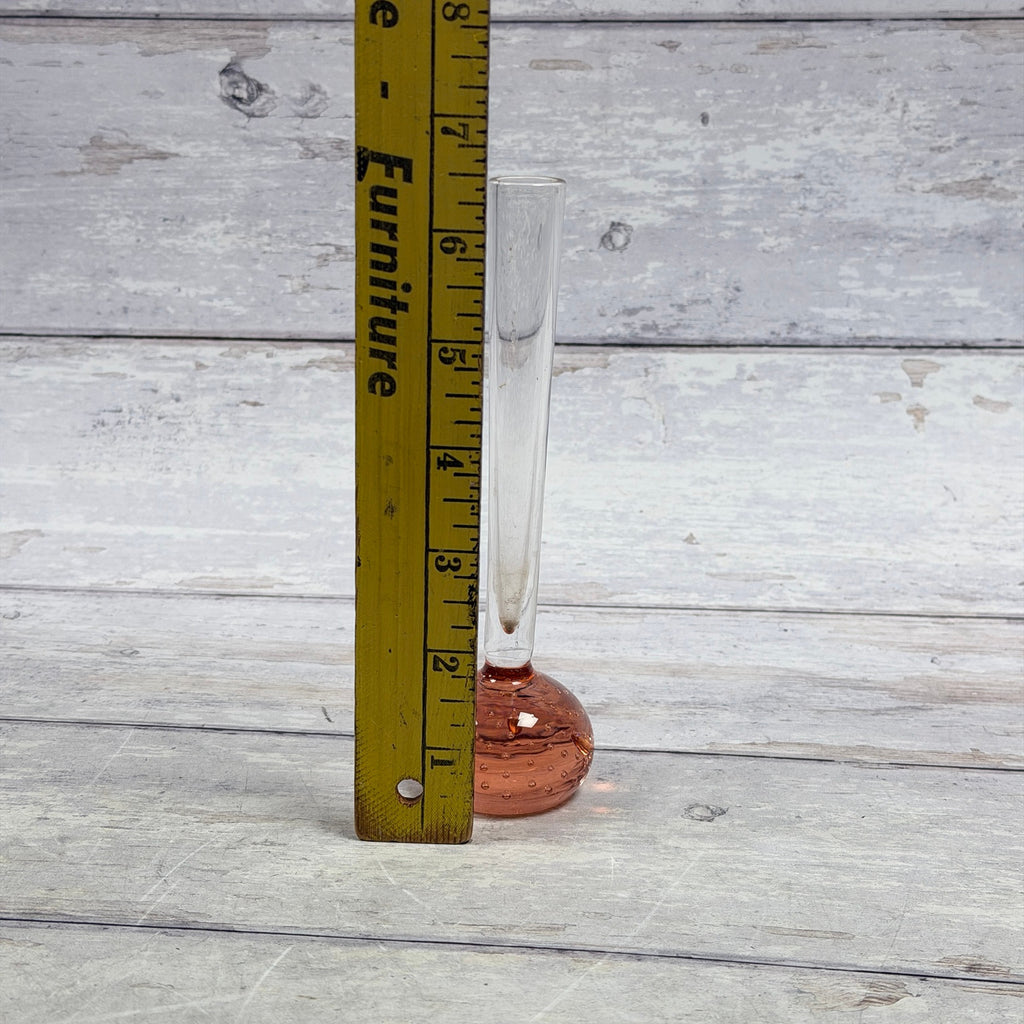 Glass bud vase beside an inch ruler showing approximate 6.5-inch height