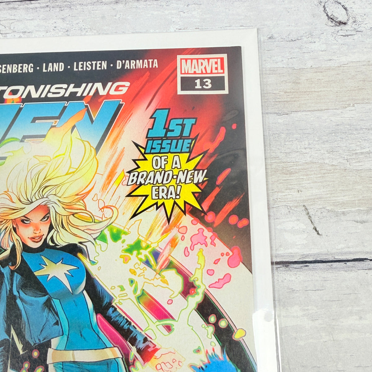 Astonishing X-Men #13 (2018), Greg Land regular cover: upper-right front detail of the actual pre-owned copy.