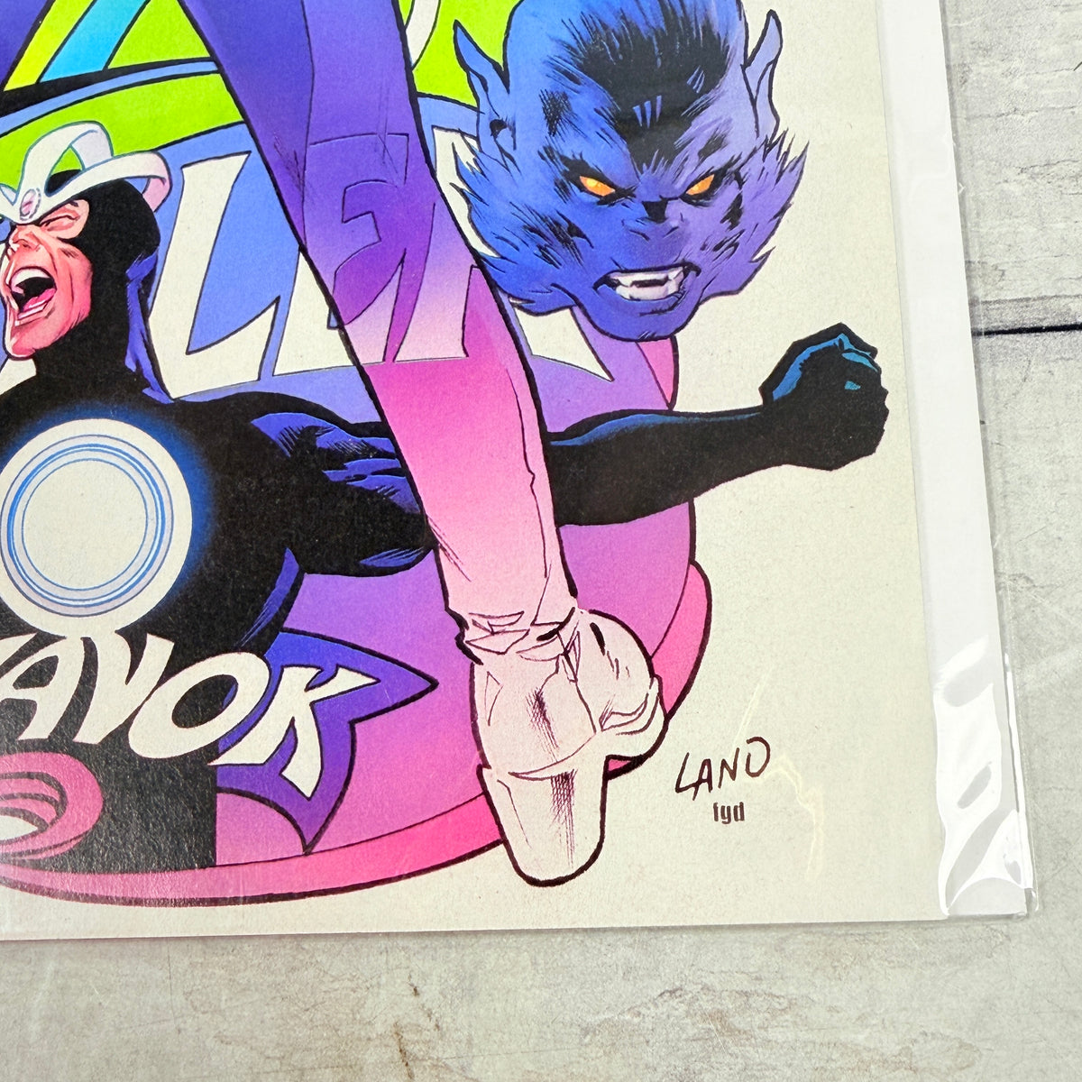 Astonishing X-Men #14 (2018), Greg Land regular cover: lower-right front detail of the actual pre-owned copy.