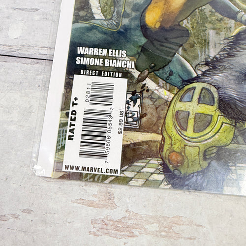Astonishing X-Men #28 (2009): lower-left front corner and spine detail of the actual pre-owned copy.