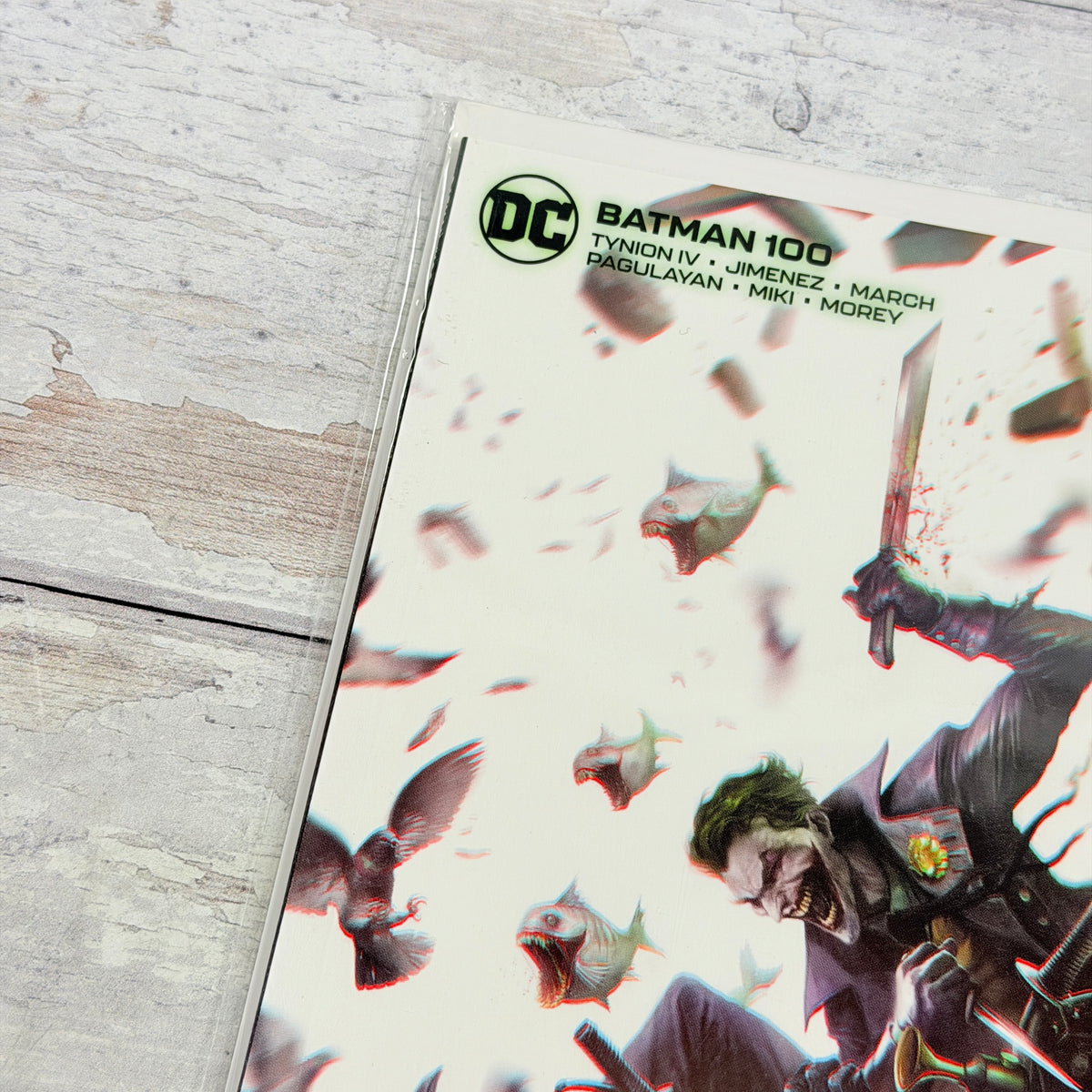 Batman #100, upper-left front detail