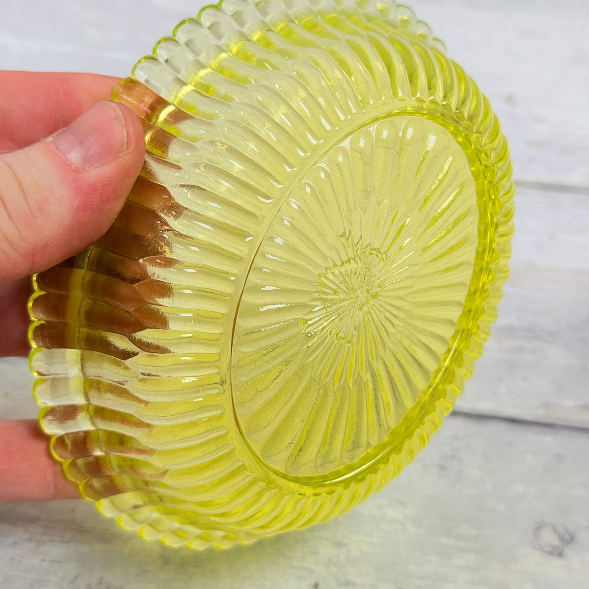 Base of Boyd vaseline glass lamb on nest dish