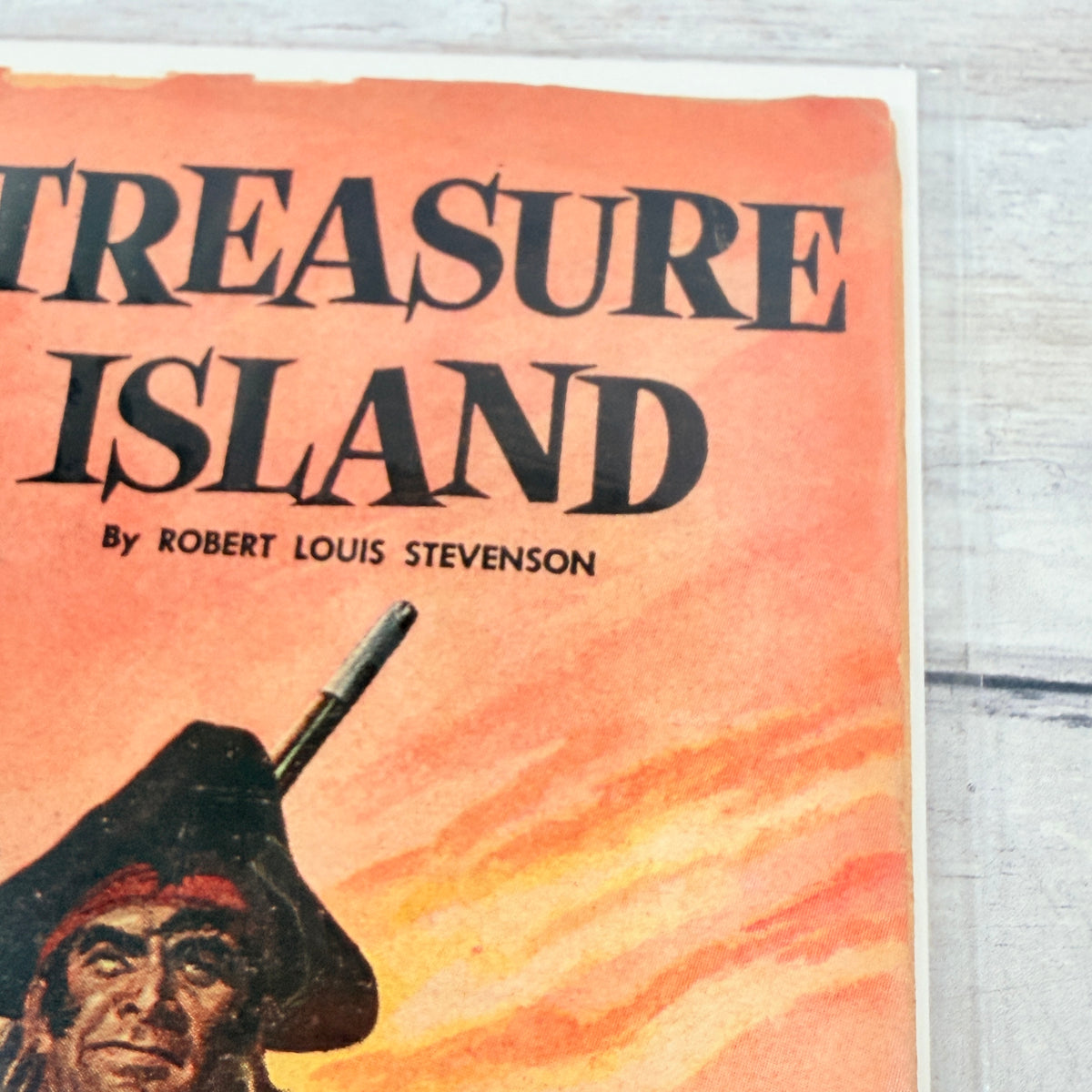 Classics Illustrated #64 Treasure Island HRN 167 reprint, upper-right cover detail