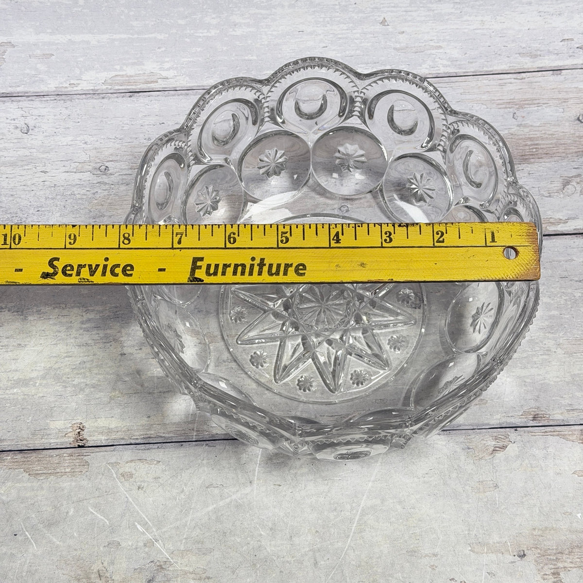 Ruler across clear Moon and Star bowl showing approximately 8-inch diameter