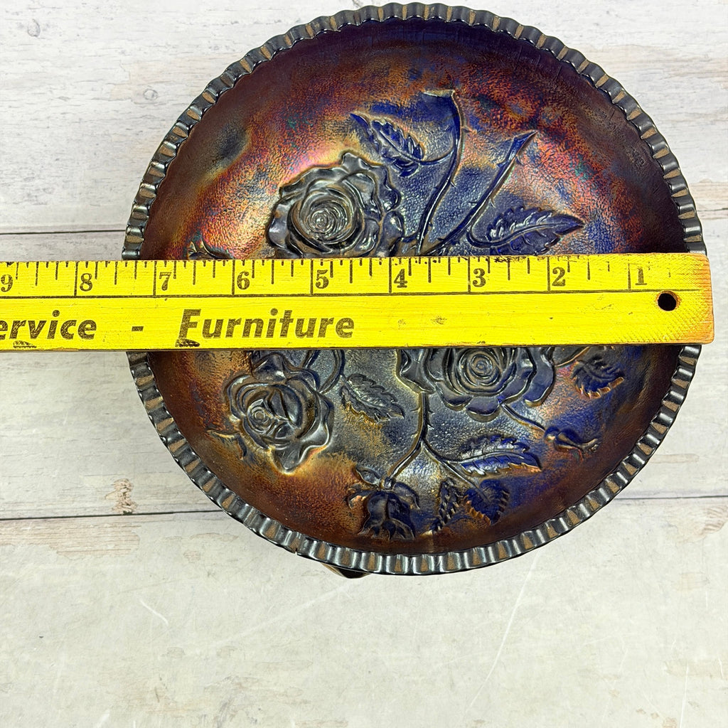 Cobalt rose-pattern carnival glass bowl with ruler showing approximate diameter