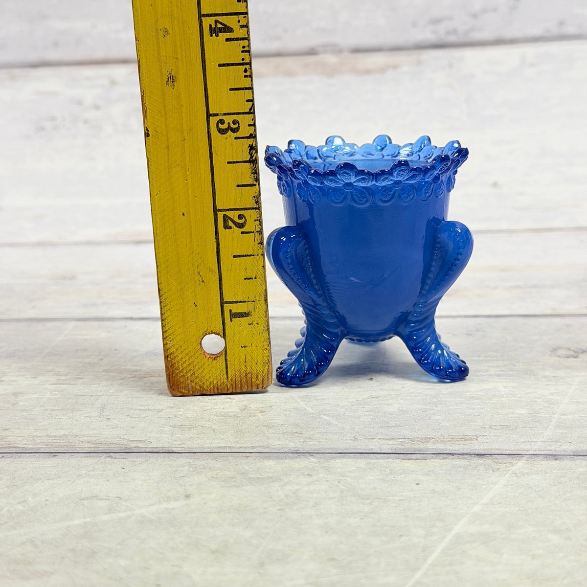 Degenhart Forget-Me-Not toothpick holder beside ruler for approximate height