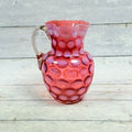 Fenton cranberry opalescent Coin Dot pitcher front view