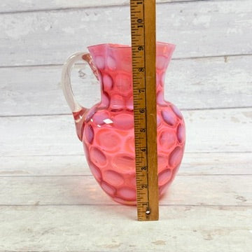 Height of pink opalescent glass pitcher with ruler