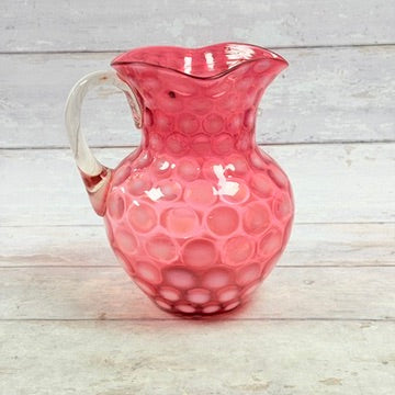 Fenton cranberry opalescent Coin Dot pitcher front