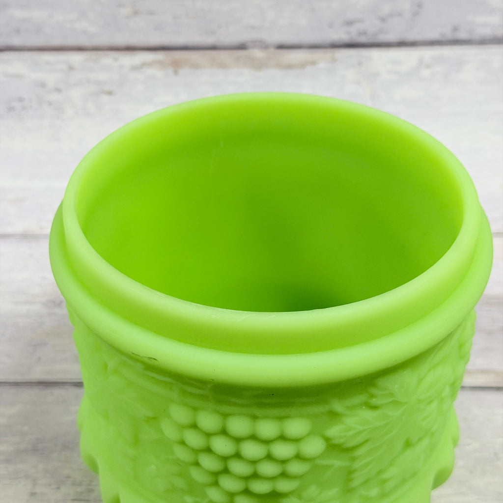Open jar showing interior, rim and grape relief on Fenton satin glass tobacco jar