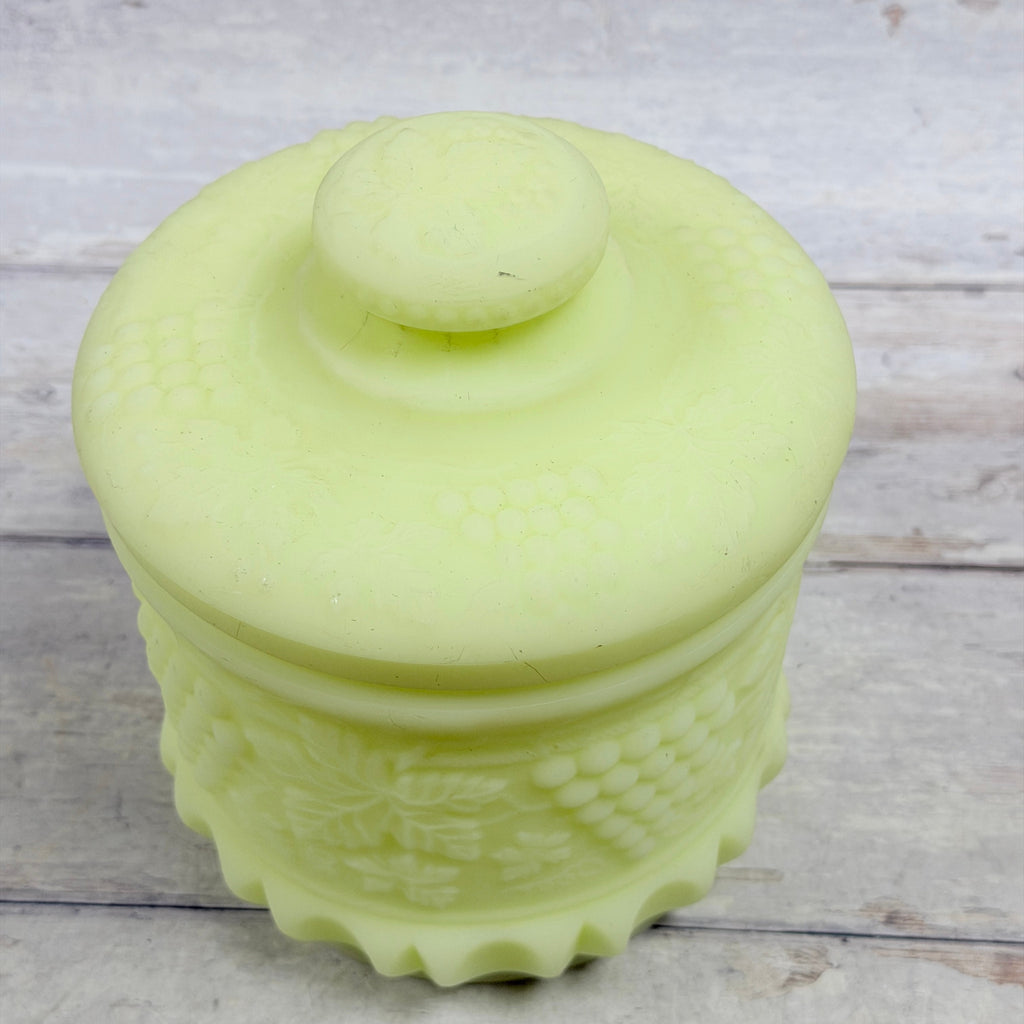 Fenton custard satin Grape and Cable tobacco jar with matching lid, viewed from above