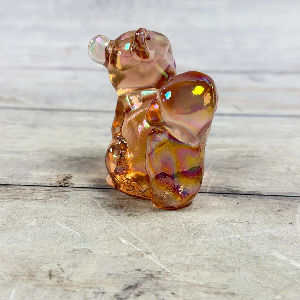 Fenton pink iridescent glass squirrel figurine, rear and curled tail