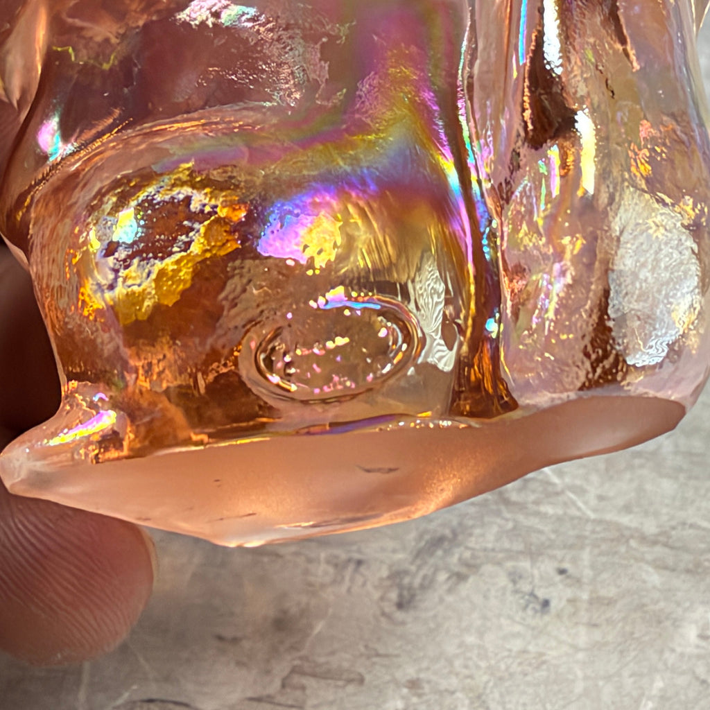 Molded Fenton oval mark and base detail on pink iridescent squirrel