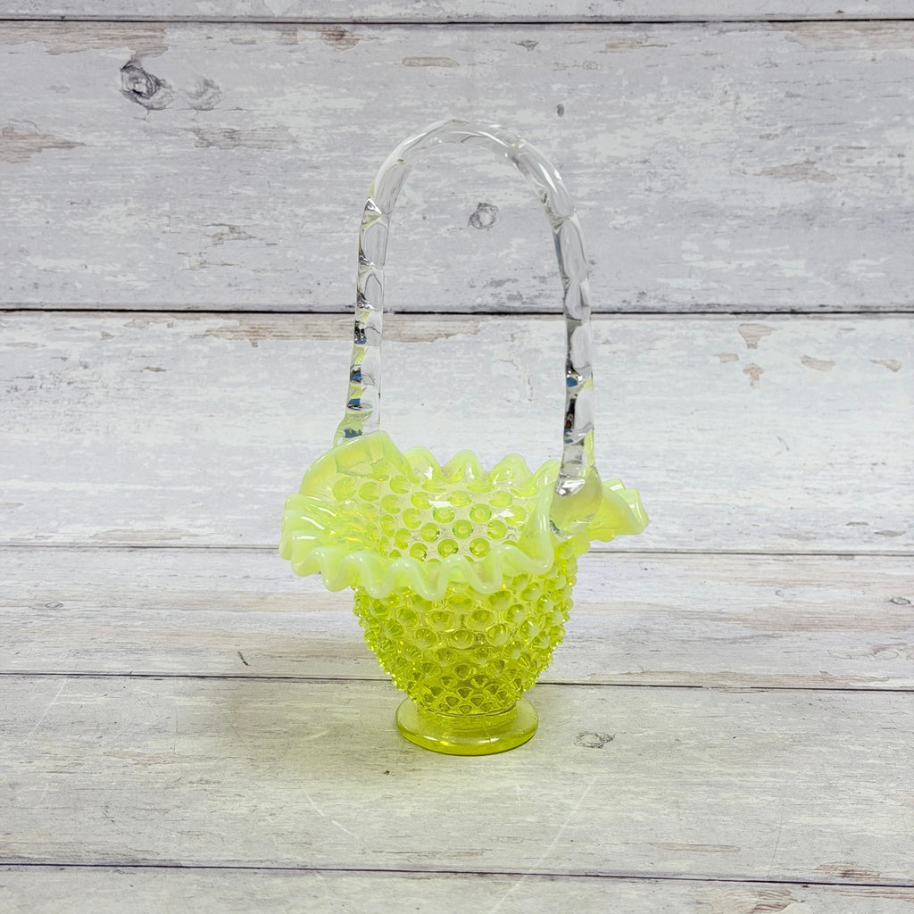 Fenton topaz opalescent hobnail glass basket with ruffled rim and clear applied handle