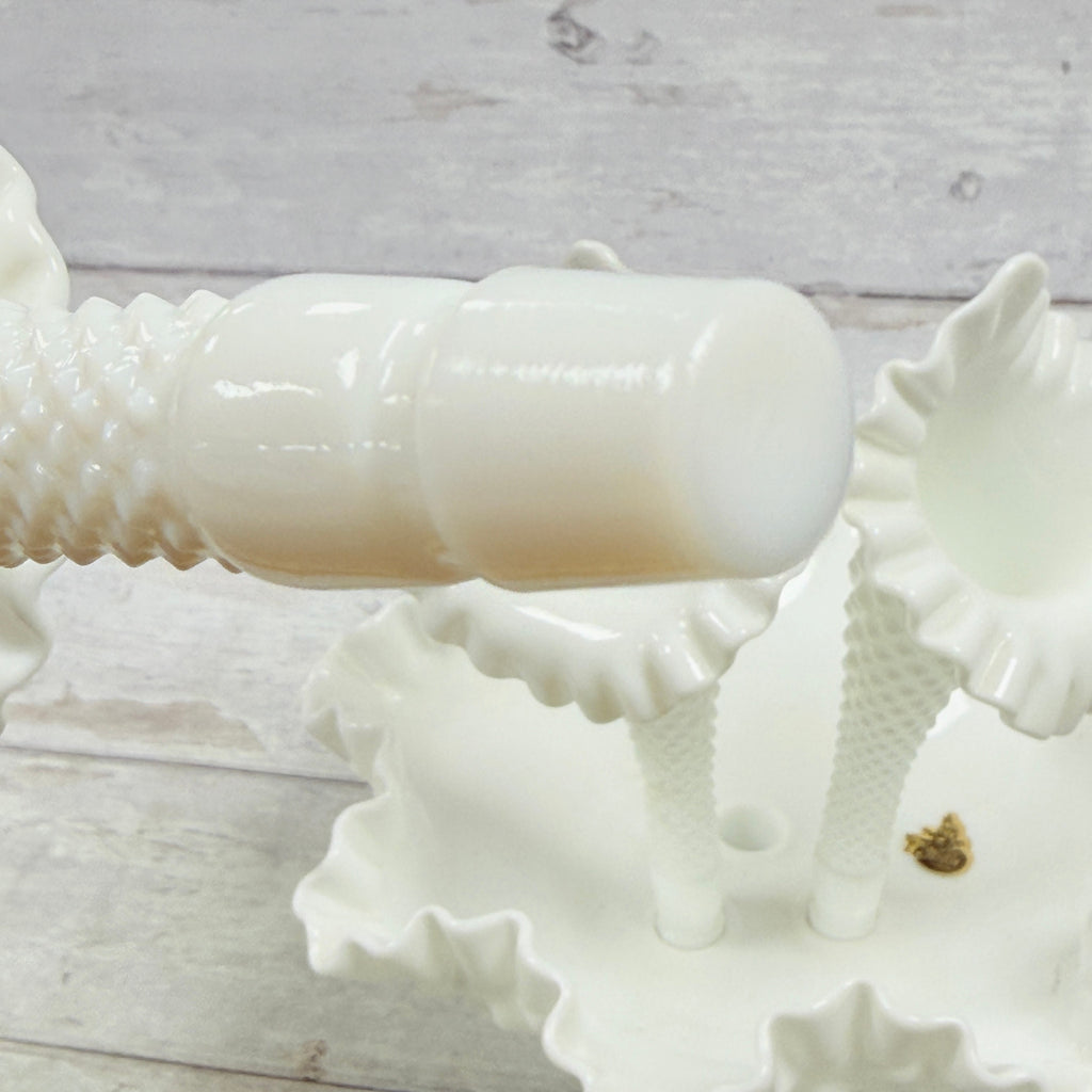 Close-up of third removable glass horn peg and molded hobnail details