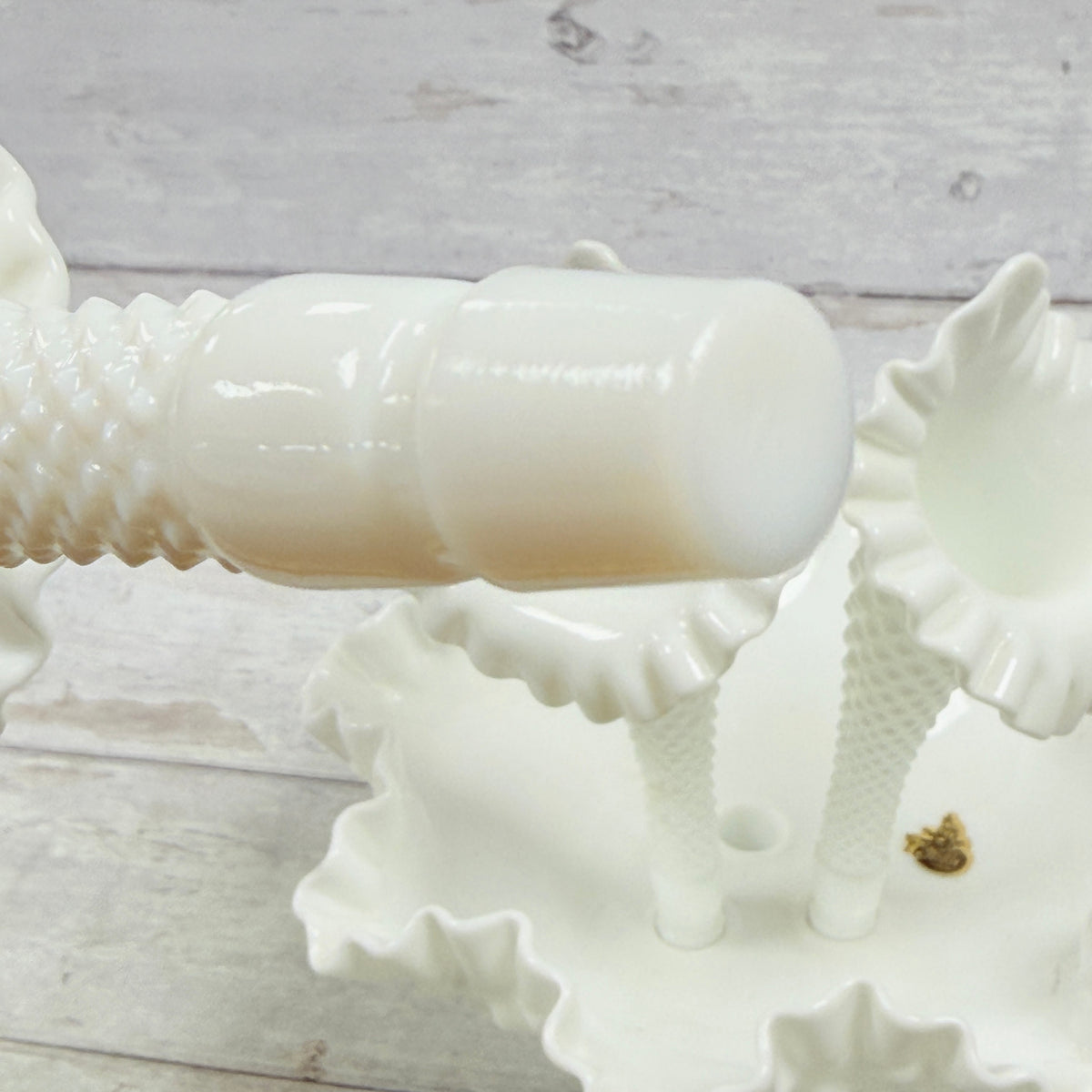 Close-up of third removable glass horn peg and molded hobnail details
