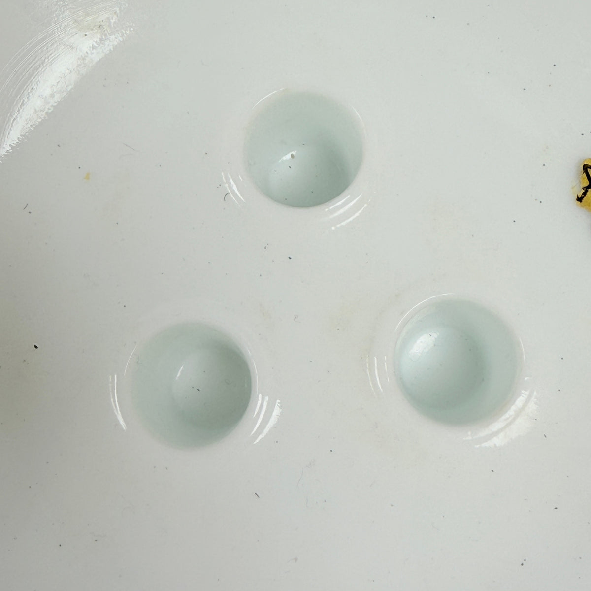 Three open sockets in Fenton milk glass epergne bowl with horns removed