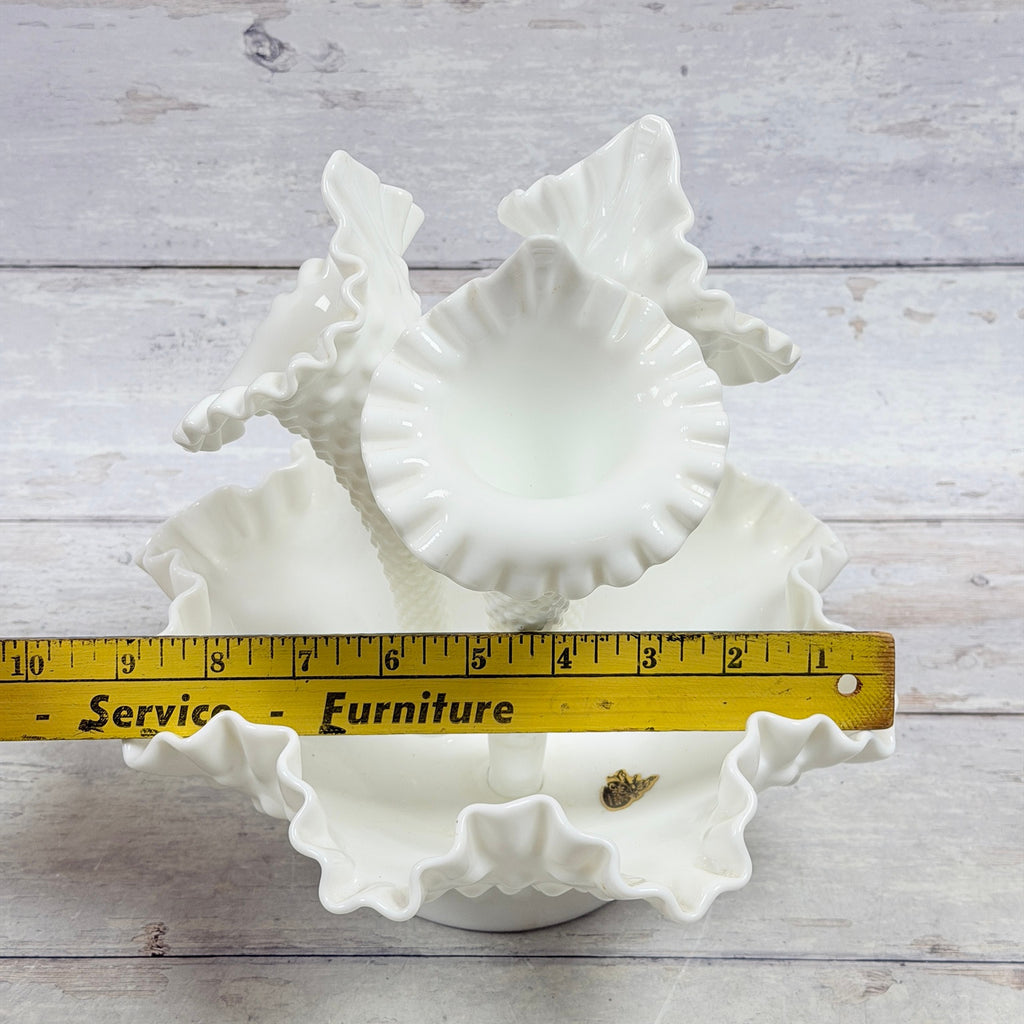 Ruler view of Fenton milk glass epergne showing approximate nine-inch width