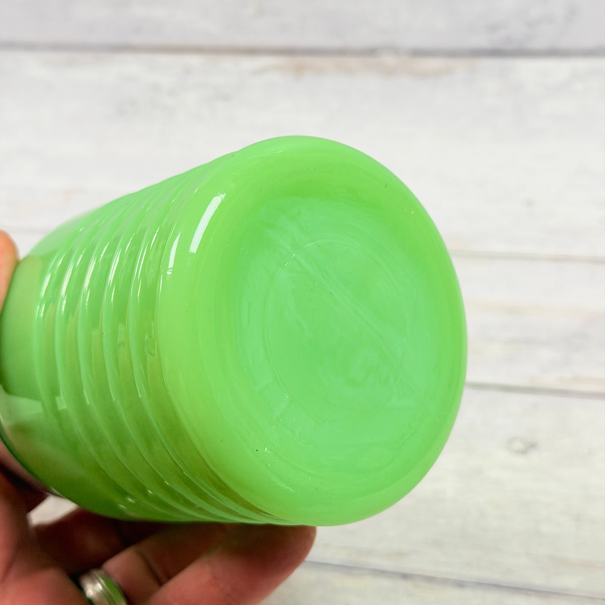 Underside of Jeannette jadeite TEA canister J02 showing base surface details