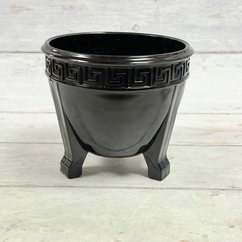 L.E. Smith black amethyst Greek Key three-footed fern bowl viewed from the side