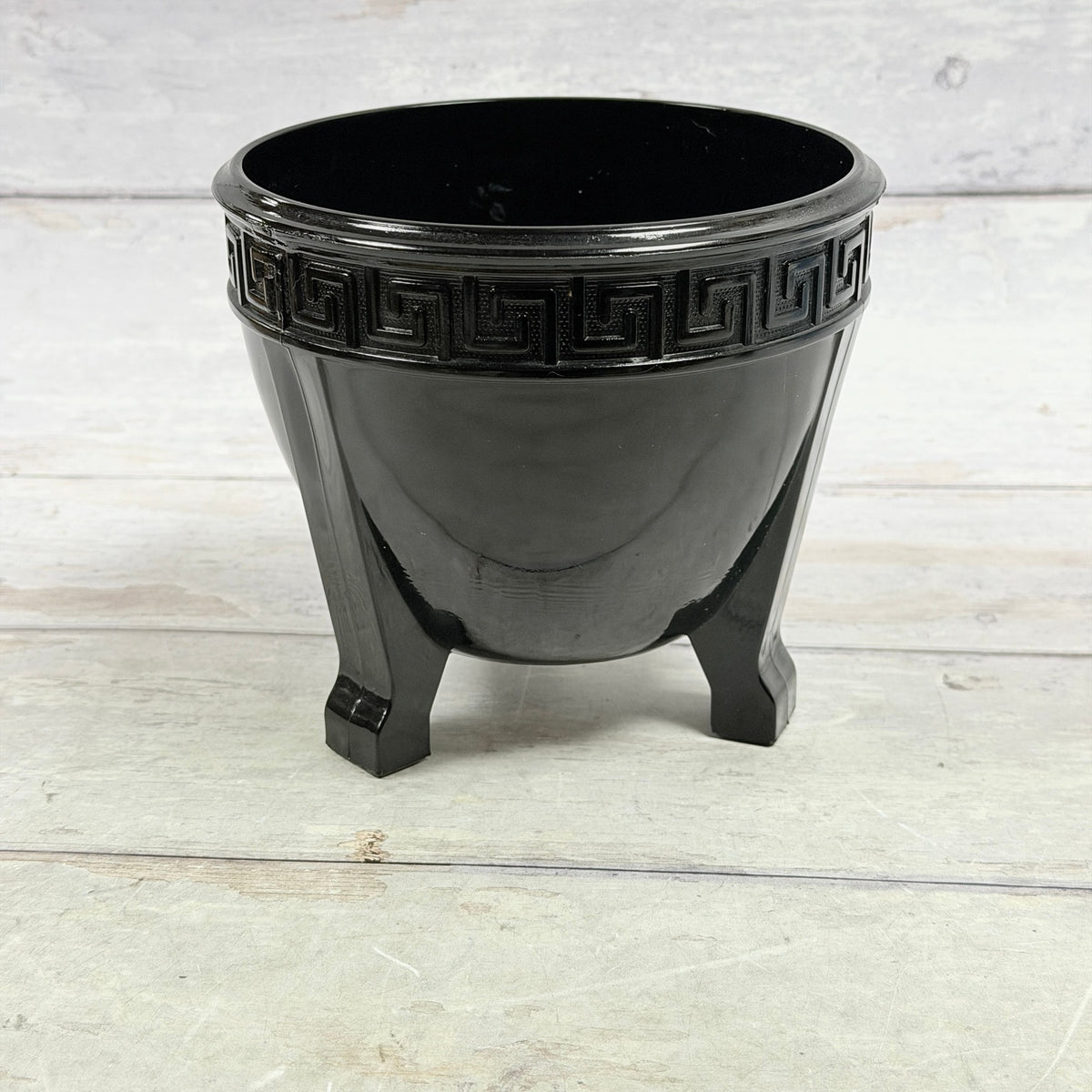 L.E. Smith black amethyst Greek Key three-footed fern bowl viewed from the side