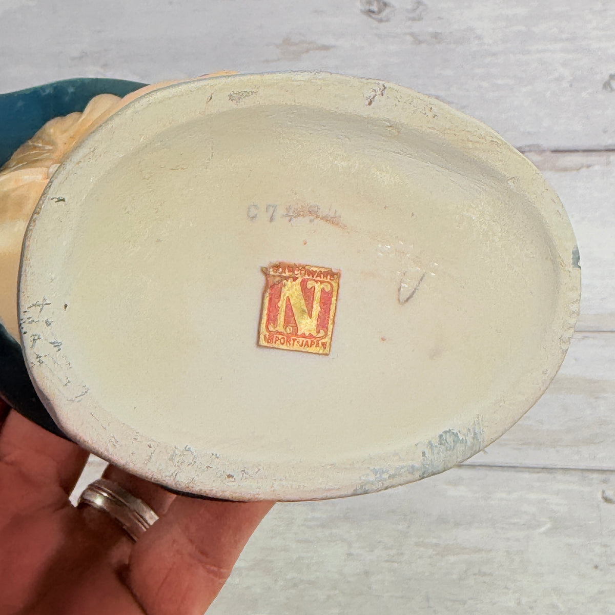 Worn Napcoware Japan label and base