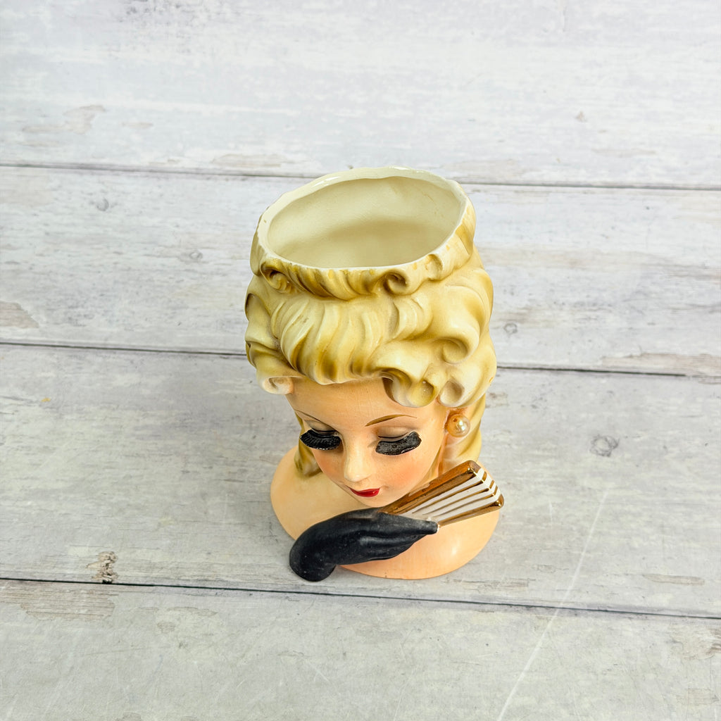 Top view of Inarco head vase showing opening and rim