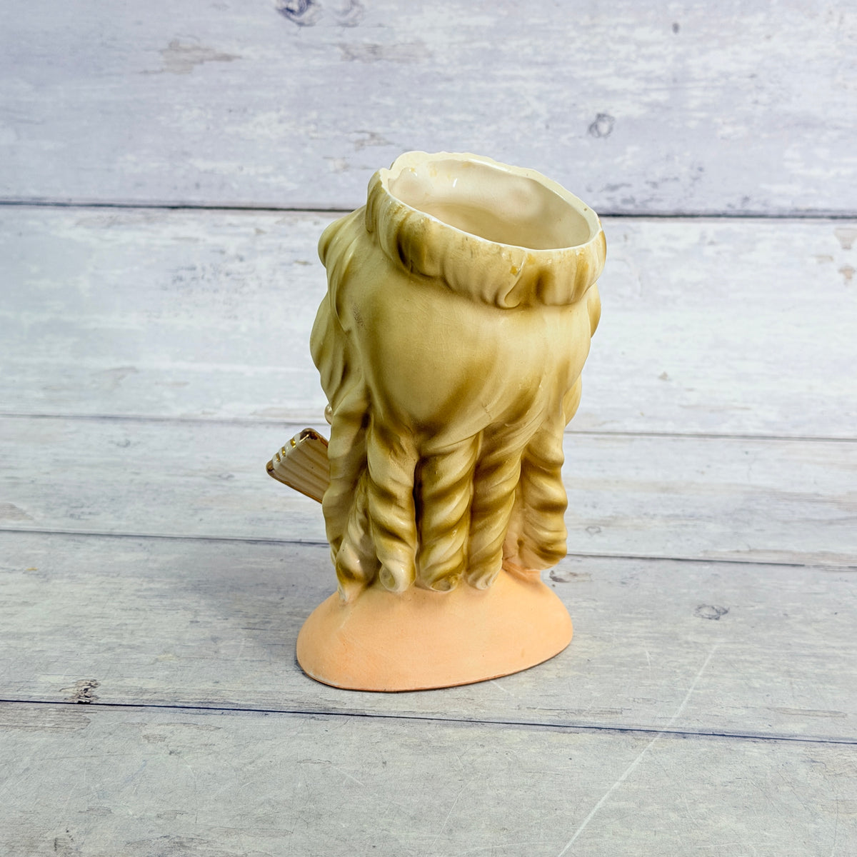 Rear of Inarco vase showing sculpted blonde ringlets