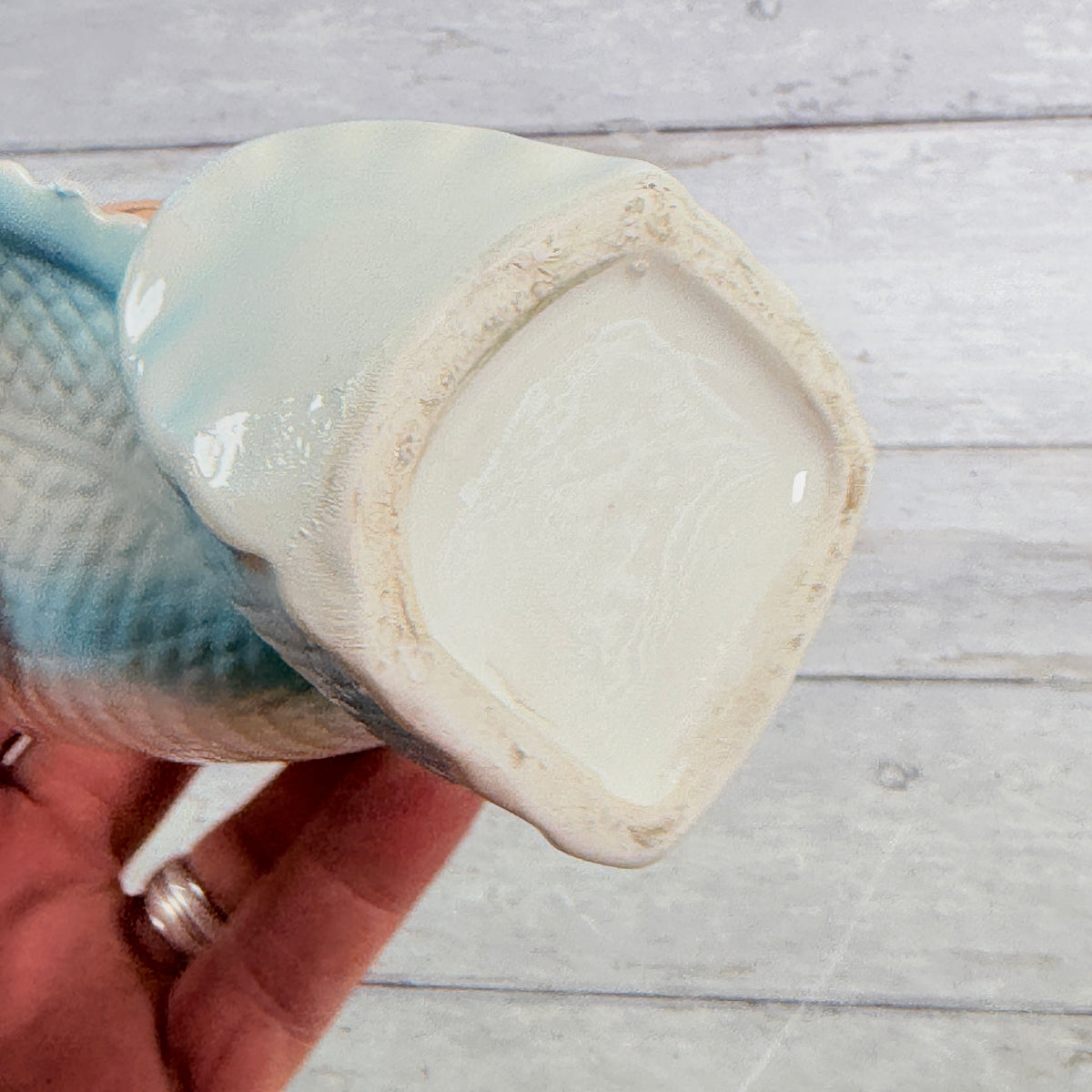 Underside showing unmarked base and wear
