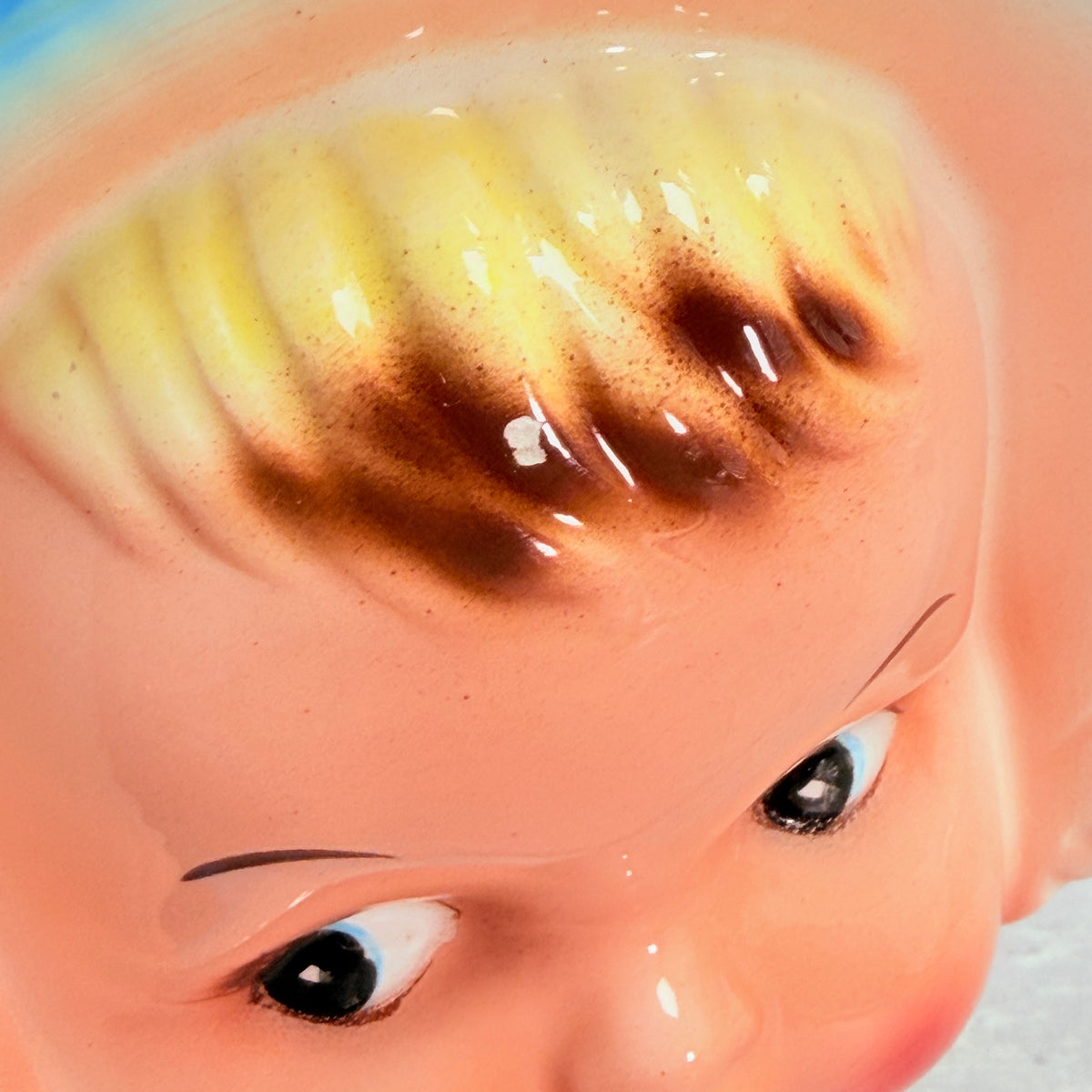 Close view of hair showing small chip or finish loss