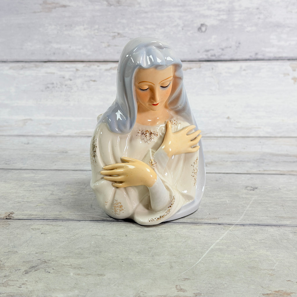 Front of white and pale blue veiled Mary planter