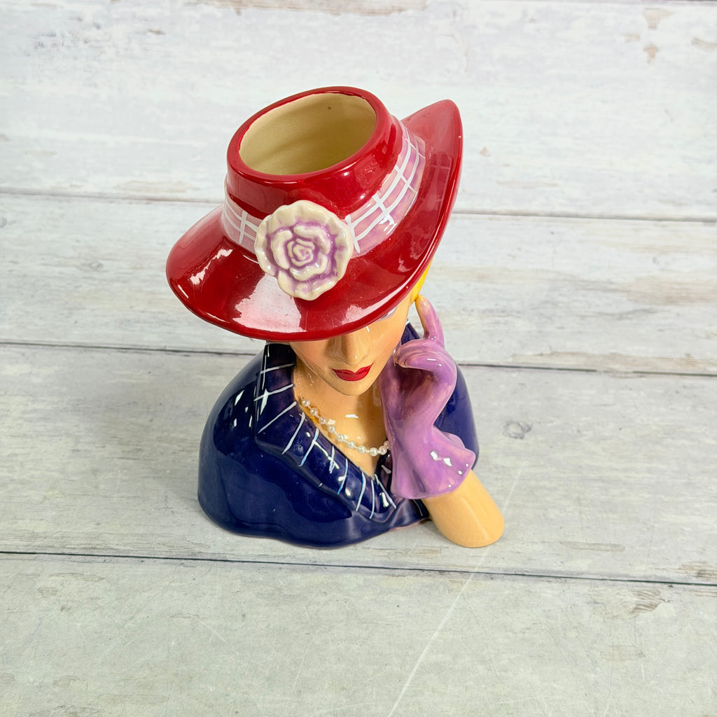 Top view of red hat flower and opening