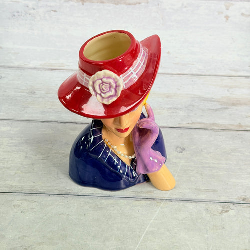 Top view of red hat flower and opening