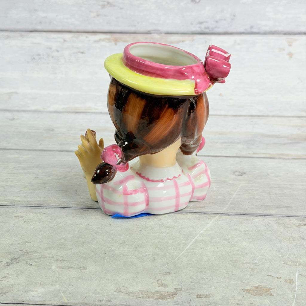Rear showing pigtails and finish loss on bows
