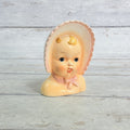 LH30 — Front of Ucagco bonneted child