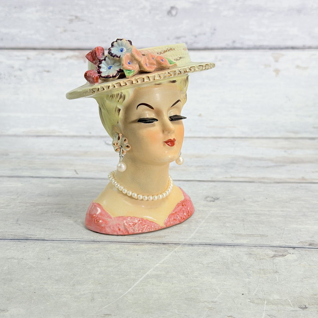 LH32 — Front of floral green hat and pink neckline