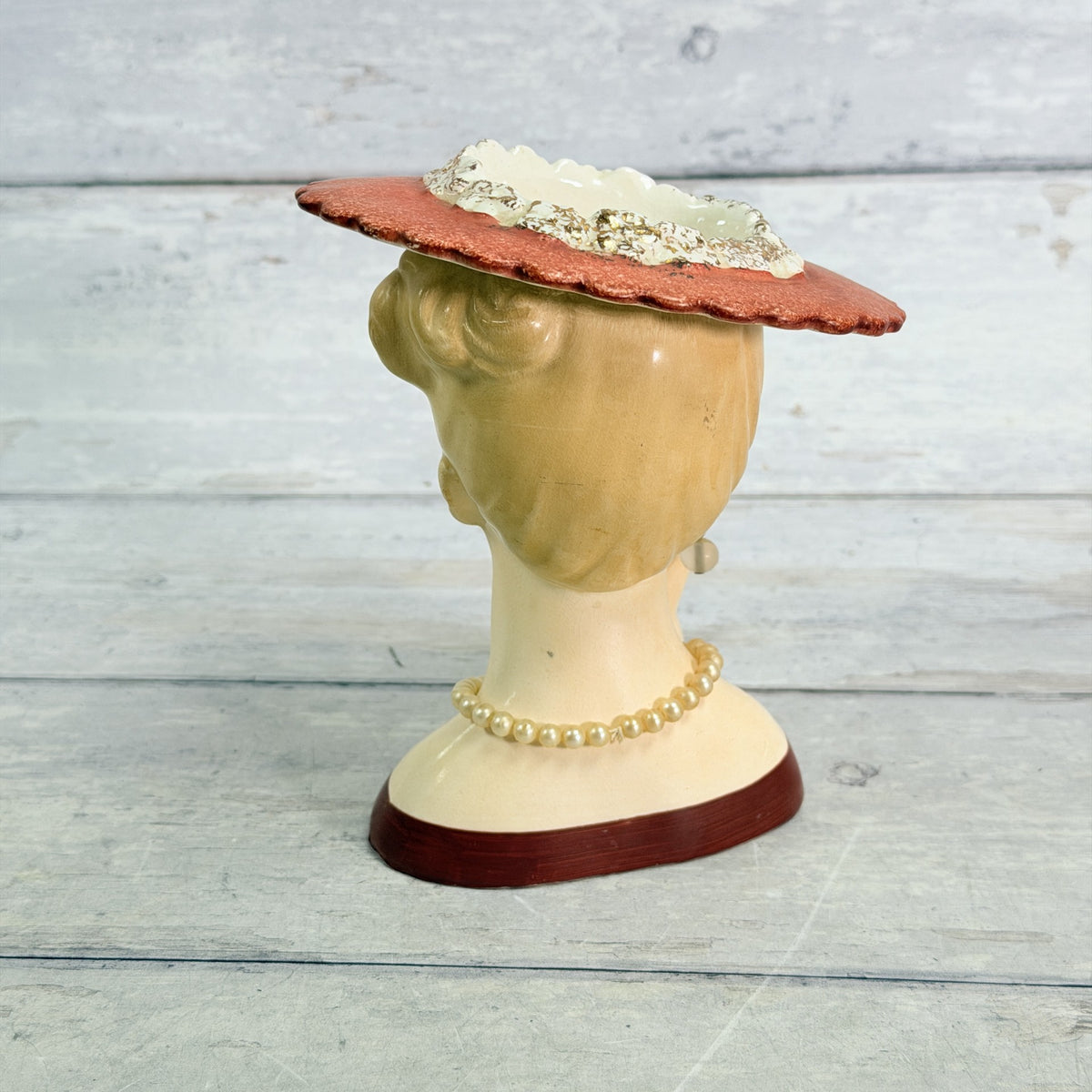 LH33 — Rear showing hat and necklace