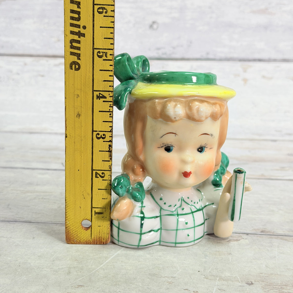 LH37 — Green plaid child beside ruler