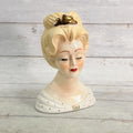 LH42 — Front of tall blonde updo vase