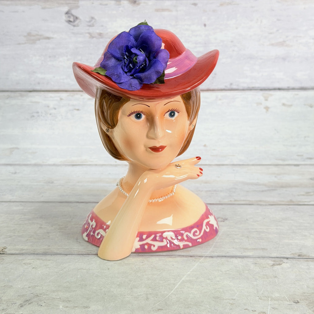 LH43 — Front of Lefton red hat coin bank