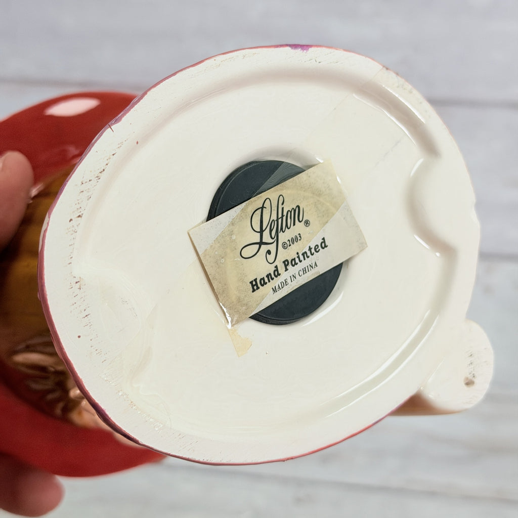 LH43 — Lefton label and black stopper beneath base