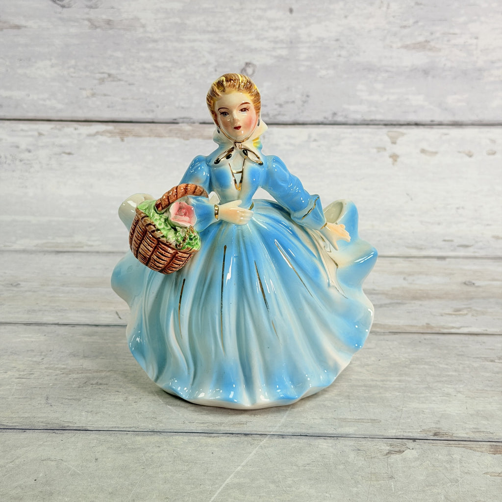 LH51 — Front of blue dress planter with basket