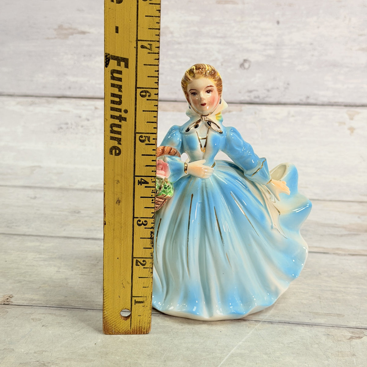 LH51 — Blue dress planter beside ruler