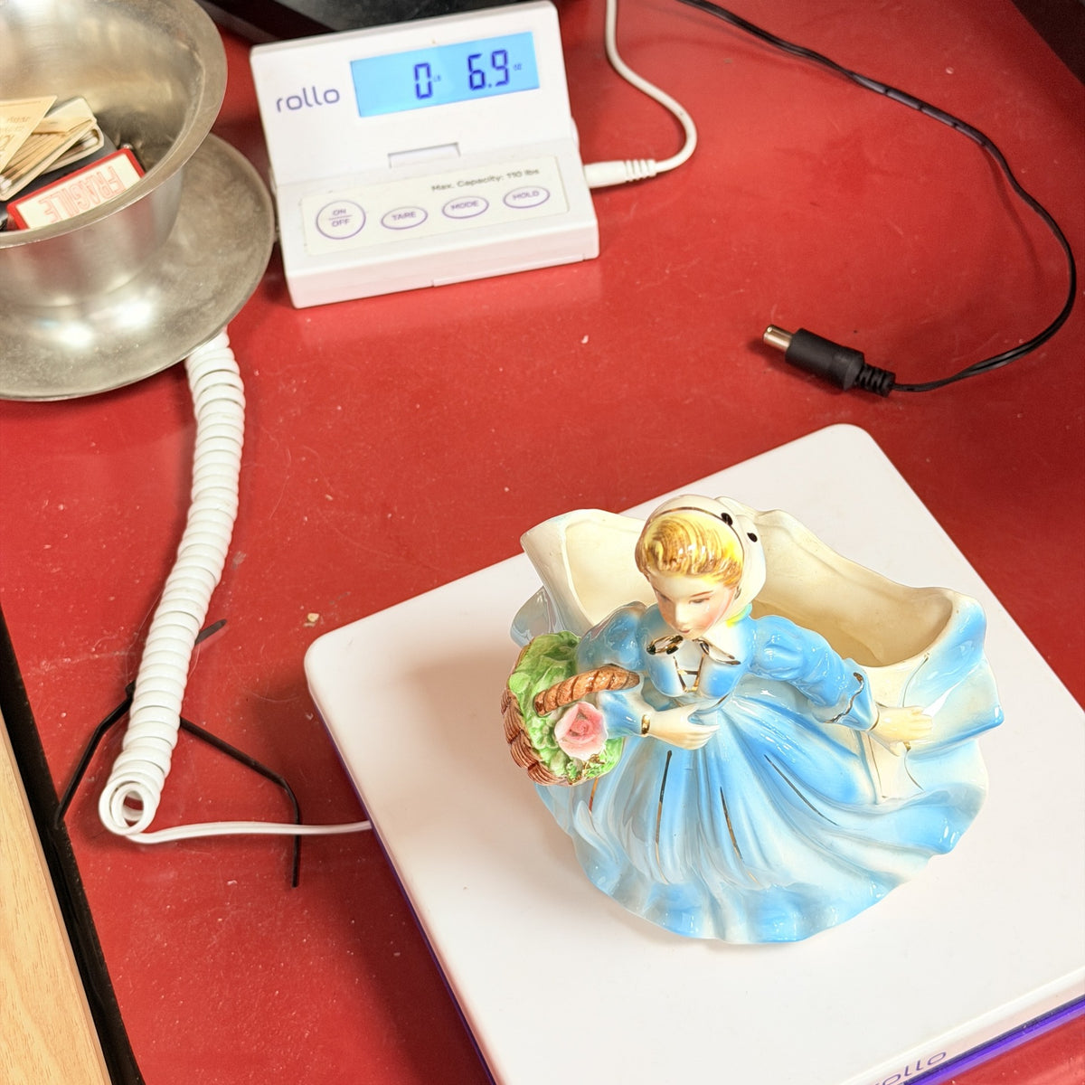 LH51 — Blue dress planter on scale