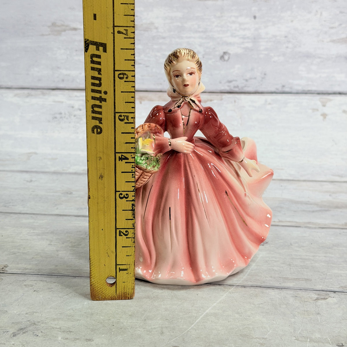 LH52 — Pink dress planter beside ruler