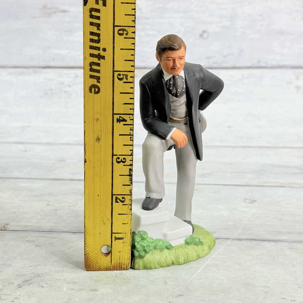 LH54 — Rhett figurine beside ruler