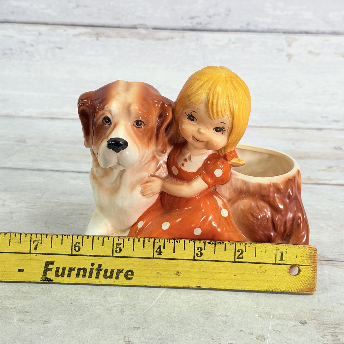 LH55 — Width ruler beside girl and dog planter